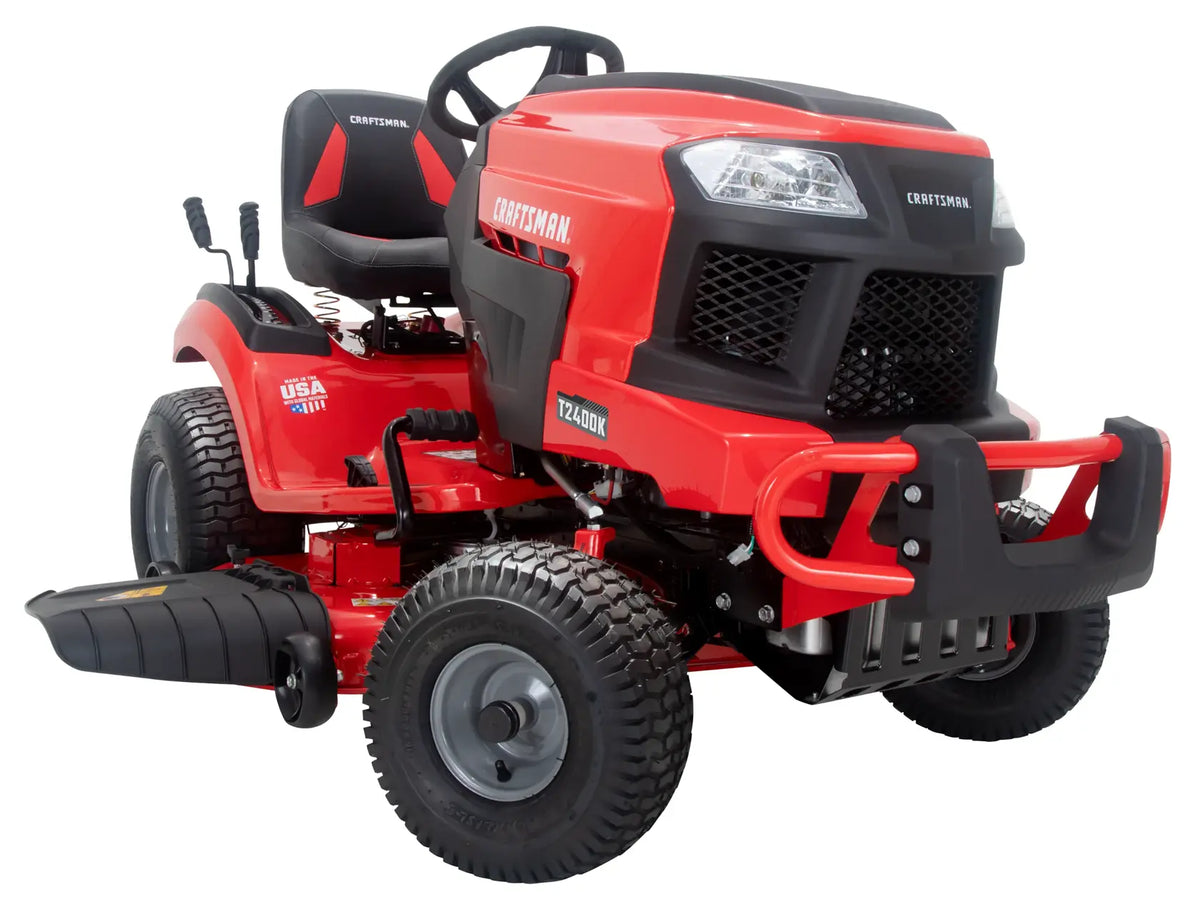 A red Craftsman riding lawn mower with black seat and large tires, photographed on a white background.