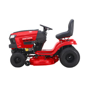 Side view of red Craftsman riding lawn mower, model CM13BL78XTA93, with black seat and tires on white background.