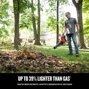 Photo of Craftsman cordless leaf blower CMCBL730P1 in use outdoors, person clearing leaves in a yard.