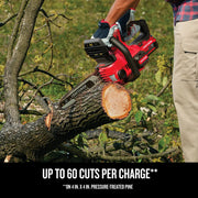 Craftsman cordless chainsaw CMCCS620B cutting tree branch outdoors, highlighted red body, side view.