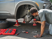 Photo of Craftsman cordless impact driver CMCF921B being used to drive a screw into wood.