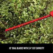CRAFTSMAN hedge trimmer CMCPHT818D1 with visible red 18-inch dual blades cutting green bushes.