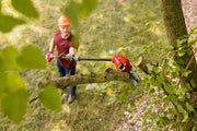 Photo of Craftsman pole saw SKU CMCPS630B cutting tree branch outdoors.