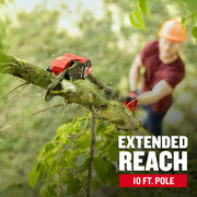Craftsman CMCPS630D1 pole saw cutting a tree branch outdoors, close-up view of saw on branch, greenery background.