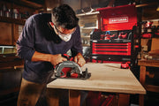 Photo of Craftsman CMES510 circular saw cutting wood, with red Craftsman tool chest in workshop background.