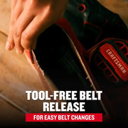 Photo of Craftsman belt sander CMEW213 showing tool-free belt release feature on wood surface.
