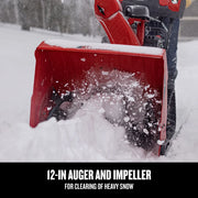 Photo of Craftsman snow blower CMGB223104 clearing heavy snow with visible auger and impeller in action.