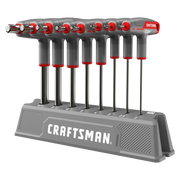 A set of Craftsman branded hex key wrenches with T-handles in varying sizes, organized upright in a gray storage stand labeled with size markings.