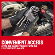 Gloved hands holding a set of CRAFTSMAN hex keys with a swivel holder in front of an open car engine.