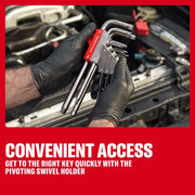 Gloved hands hold a Craftsman hex key set with pivoting holder near a car engine for easy access.