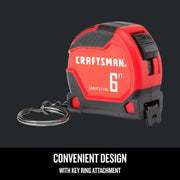 Photo of Craftsman tape measure CMHT37106G, 6 ft length, red and black, key ring attachment, angled view.