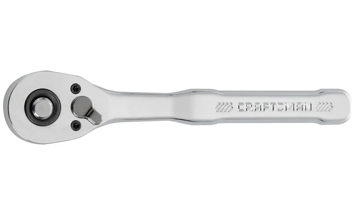 A silver ratchet wrench with a flat handle, featuring a switch lever and a round socket head. The word 'CRAFTSMAN' is engraved on the handle.