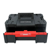 A black and red Craftsman storage box with a handle on top and an open drawer in the front, labeled VersaStack.