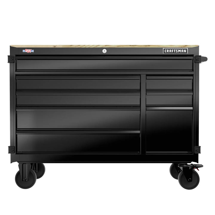 Front angle photo of Craftsman black tool chest CMST98274BK with multiple drawers and wood top on caster wheels.