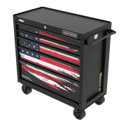 A black rolling tool chest with four drawers, featuring an American flag design with a distressed paint effect on the drawer fronts. The chest has caster wheels and a side handle, with the brand name 'Craftsman' displayed above the drawers.