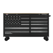 A large black rolling tool chest with multiple drawers, featuring an American flag design across the front. The brand name 'Craftsman' is visible on the upper right side, and there are labels indicating it is made in the USA with US and global materials.