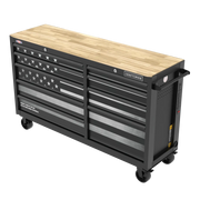 A large black metal rolling tool chest with multiple drawers, a wooden top surface, and caster wheels. The front features a stylized graphic of the American flag, and the brand name 'Craftsman' is displayed on the top right drawer.