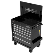 A black rolling tool chest with five drawers and a top compartment, featuring the Craftsman logo. The chest is open, showing the interior space, and has wheels for mobility.