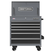 A gray Craftsman rolling tool chest with multiple drawers for storage. The chest has a top compartment opened upwards, caster wheels for mobility, and Craftsman branding on the front.
