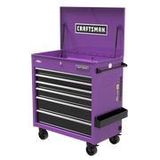 A purple Craftsman rolling tool chest with an open top compartment, five drawers, and side handles. The chest is on four black caster wheels and has a side tray attached.
