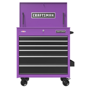 A purple Craftsman rolling tool chest with multiple black drawers, a lock, caster wheels, and an open top compartment.