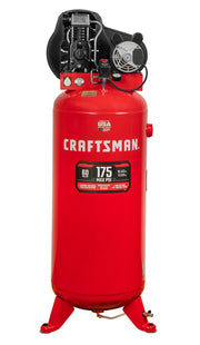 A red vertical air compressor with 'CRAFTSMAN' branding, featuring a motor and control components mounted on top. The compressor displays specifications indicating 60-gallon capacity and 175 max PSI. It stands on three red metal legs.