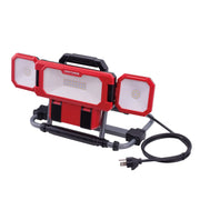 Craftsman LED work light CMXELAYMPL1033, red and black, front angle, with power cord visible.
