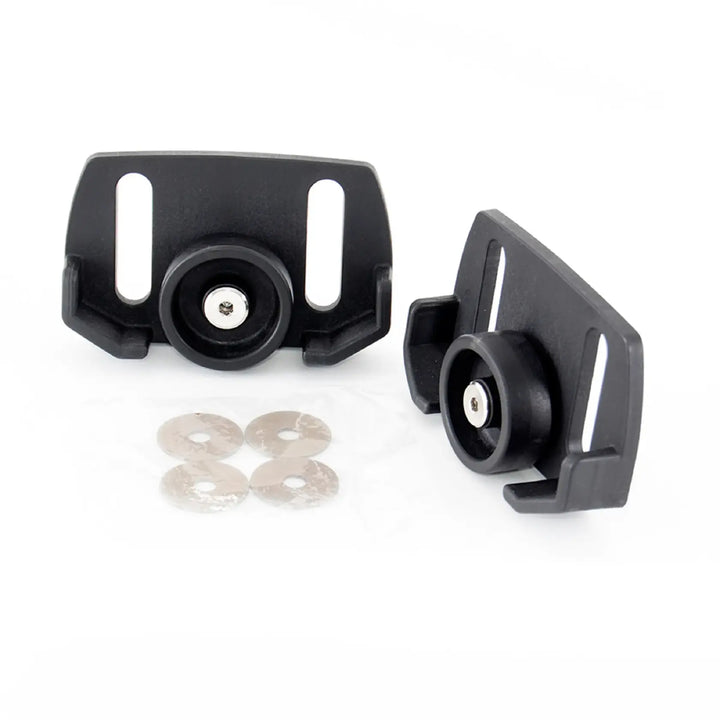 Two black camera accessory mounts with round washers, flat lay, white background beauty shot, top view