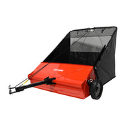 Front angle photo of Craftsman lawn sweeper CMXGZBF45521 with red body and black collection bag.
