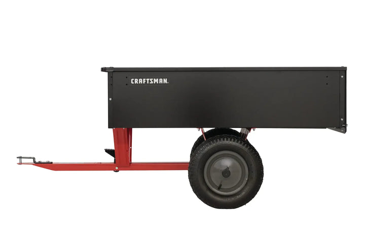 Photo of Craftsman utility trailer CMXGZBF7124355, black body with red frame, side angle on white background.
