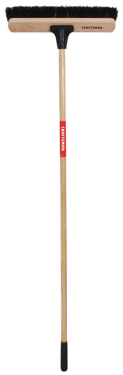 Craftsman CMXMLBA7218A push broom with wooden handle, black bristles, front view on white background.