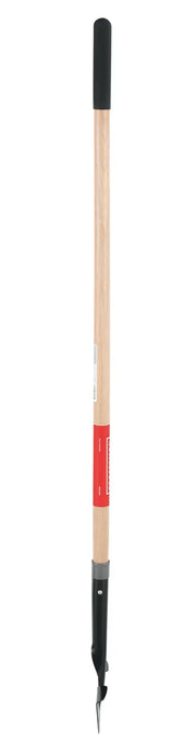 A long-handled manual post hole digger with a wooden handle and a metal blade attachment at the end, designed for digging narrow holes in the ground.