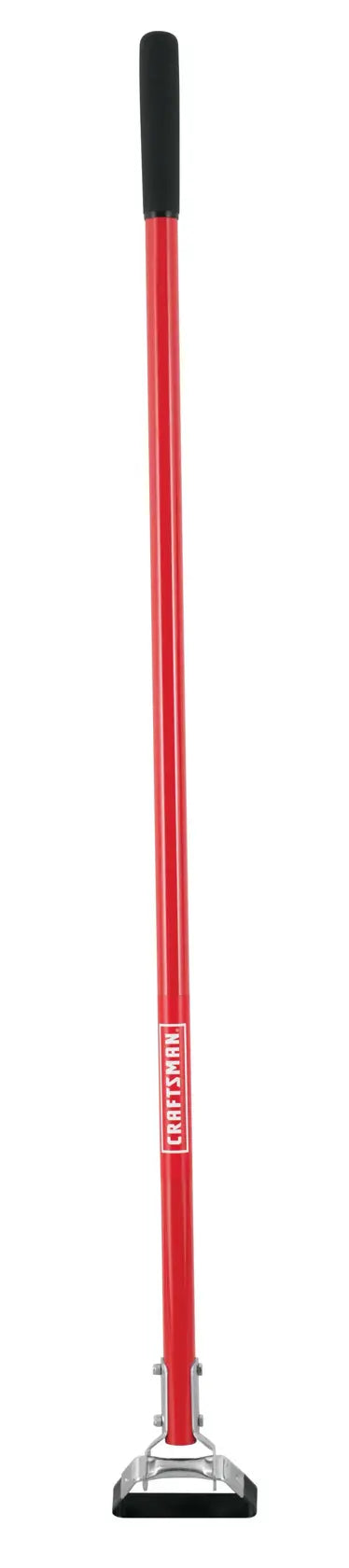 A long-handled tool with a red shaft, black grip at the top, and a flat metal base used for tamping and leveling surfaces.