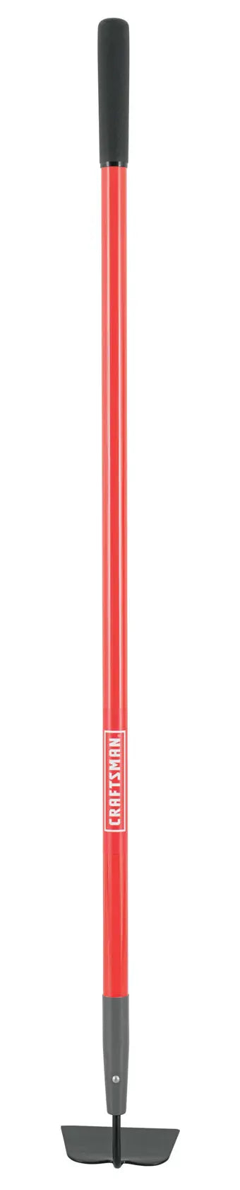 A long-handled red steel digging tool with a black rubber grip at the top and a flat, wide metal blade at the bottom, designed for tasks such as trenching or edging in gardening or landscaping.
