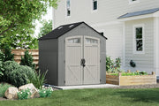 CRAFTSMAN CMXRCSCBMSC7752 gray outdoor storage shed with double doors and windows, shown in a backyard setting.