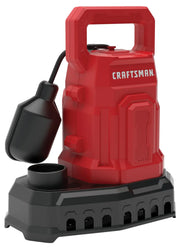A red and black Craftsman branded submersible utility pump with a handle on top and a black float switch attached to the side.