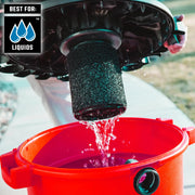 Craftsman wet foam filter CMXZVBE38779 with water draining into red bucket, outdoor scene.